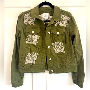Army green LuLaRoe jacket with floral appliqués. Women’s size M.